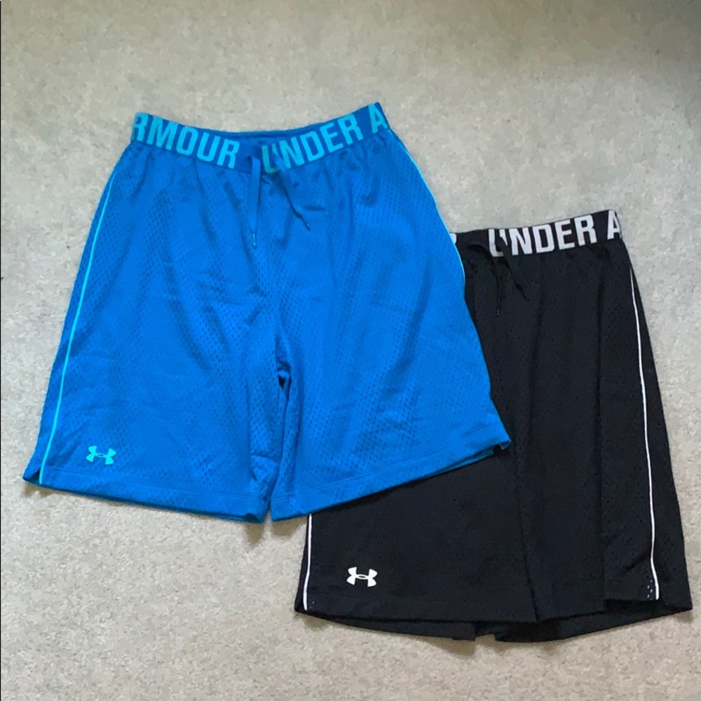 two pairs of under armour basketball shorts